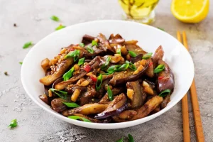 Crispy Fried Eggplant with Sautéed Green Peppers