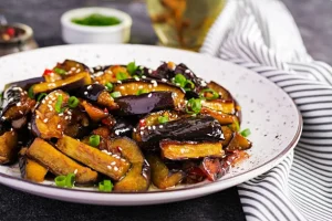 Crispy Fried Eggplant with Sautéed Green Peppers