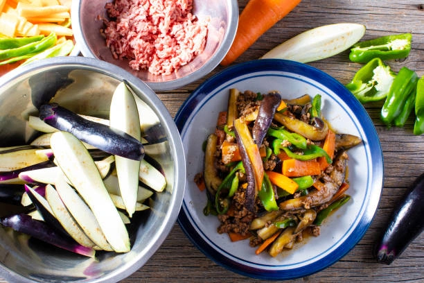 Crispy Fried Eggplant with Sautéed Green Peppers